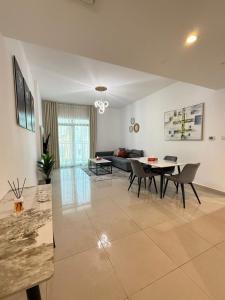 Large 1BR Apartment with Balcony in JVC - JLiving