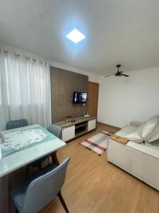 Apartamento de dois quartos para até quatro pessoas com 01 vaga privativa