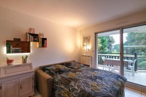 T2 cosy - vue sur le golf - proche plage