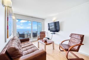 Exclusive 3BR Apartment with Terrace & Sea View