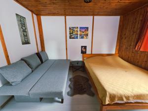 Casuta dintre brazi - Valea Doftanei - 2 camere