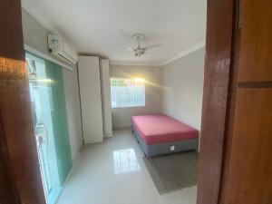 Suíte com entrada independente, garagem e área de churrasqueira