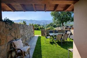 Villa Porrua 1 – Jardín, Barbacoa y Chimenea