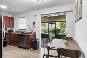 Wellness Retreat Sleeps 12 With Yard and Patio