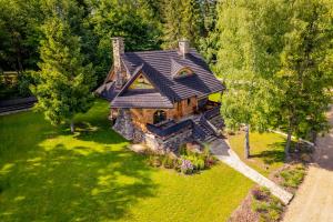 Baśniowy Domek Groń z Jaskinią SPA - Osada Jaworzyny