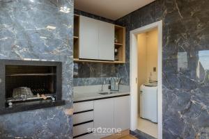 Apto c churrasqueira a 200m da Praia IFA0054