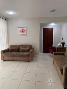 Apto amplo com churrasqueira a 2 minutos da prainha!