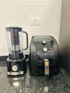 Vista mar no coração de Praia Grande Ar condicionadogaragem