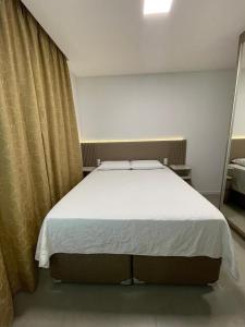 Apartamento com 2 vagas de garagem, próximo a roda gigante