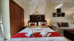 Authentic Arabian at Pearl- Free & Private Beach Access 1007