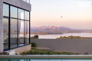 StayVista at Aria by the Hills with Pool, Lawn, Wi-Fi