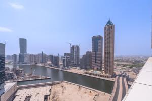 StayShort - Elegant 1BR Apartment in Business Bay Canal Views