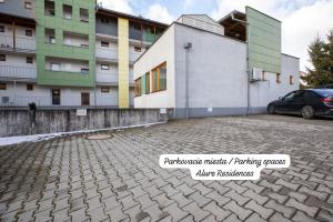 ALURE RESIDENCES 2 - 24h self check-in & private parking next to the apartment building included, CITY CENTER right on SNP Square in a quiet passage, new building, best deal in town