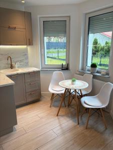 Apartament Beige z ogródkiem