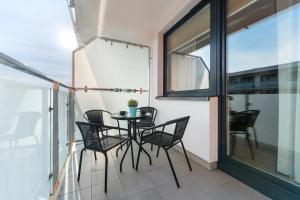 Przytulne Apartamenty z Balkonem w Centrum Blisko Plaży by Noclegi Renters