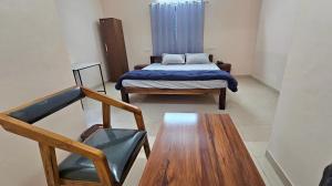 Cozy Den Hotel