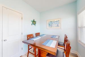 Dog-friendly, water-view home with scenic balcony, grill, washerdryer & AC