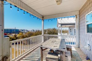 Dog-friendly, water-view home with scenic balcony, grill, washerdryer & AC