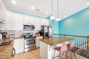 Beachfront home with beach access, community pool, foosball table, ocean views