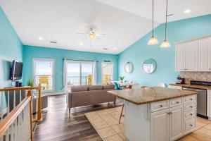 Beachfront home with beach access, community pool, foosball table, ocean views