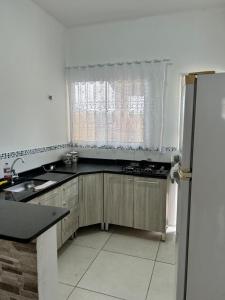 Casa de temporada em Itanhaem em condomínio