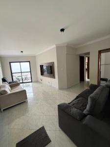 Apartamento com piscina beira mar, Praia Grande