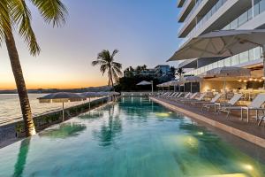 Panarea Beachfront Living - Pools Spa Gym & Luxury Amenities