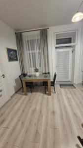 Plytų Sienos Apartamentai