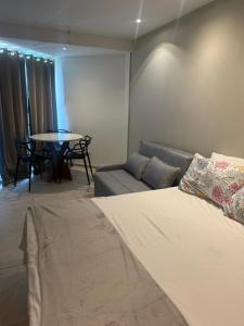 Flat praia de Craneiros aconchegante e próximo ao mar