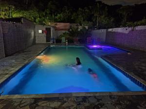 Casa em Bertioga com piscina aquecida Sitio família ROCHA