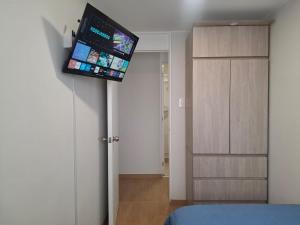 Habitación cómoda con baño compartido