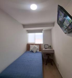 Habitación cómoda con baño compartido