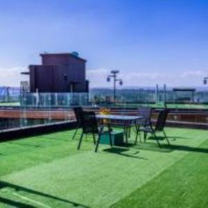 celestial suites apartment with heated swimming pool well equipped gym ample parking space children playing ground and amazing scenic views