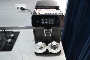 Premium Central Studio - Home Cinema și Confort