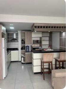 Apartamento Térreo Familiar a 100m da Praia Canto Grande Com Garagem