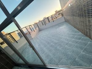 Apto 4 Dormitórios com vista mar, wifi, Netflix, área gourmet, ar condicionado