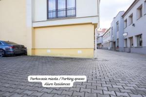 ALURE RESIDENCES 10 - 24h self check-in & private parking next to the apartment building included, CITY CENTER right on SNP Square in a quiet passage, new building, best deal in town