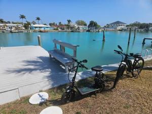 Oasis Waterfront Treasure Island Condo with Patio Dock and Johns Pass