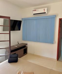 Refúgio na natureza com piscina e churrasqueira