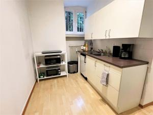 UrbanSuites - Zentrale & historische Pförtnerwohnung