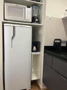 Studio perto da praia SOL, ar condicionado, estacionamento