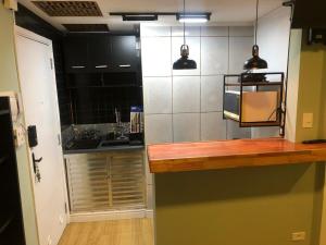 Studio Frente à Praia com excelente localização, Ar Cond , Wi fi 500 mg