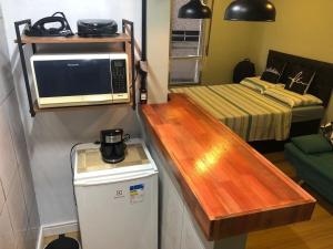 Studio Frente à Praia com excelente localização, Ar Cond , Wi fi 500 mg