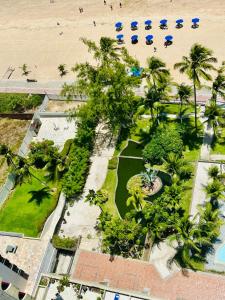 Flat pe na areia frente mar