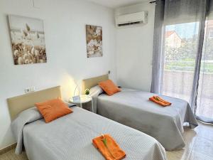 Apartamento Familiar con Jardín, Piscina y Climatización cerca de la Playa en Salou - ES-165-2
