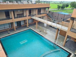 Club Mango Resort by Adroit Connect Hospitality