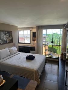 Flat Life Resort com vista do Lago