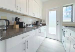 Beachside Escape with King Bed plus 2 Queens Miami