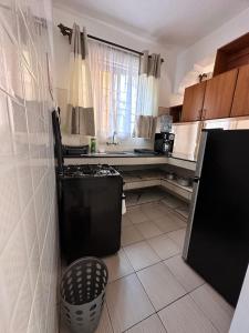 Cozy Nyali 1 BR along links road with AC