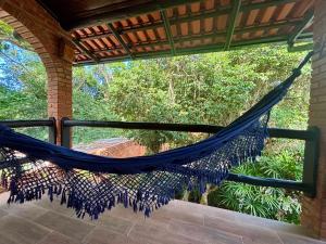 Casa pé na areia em condomínio com piscina